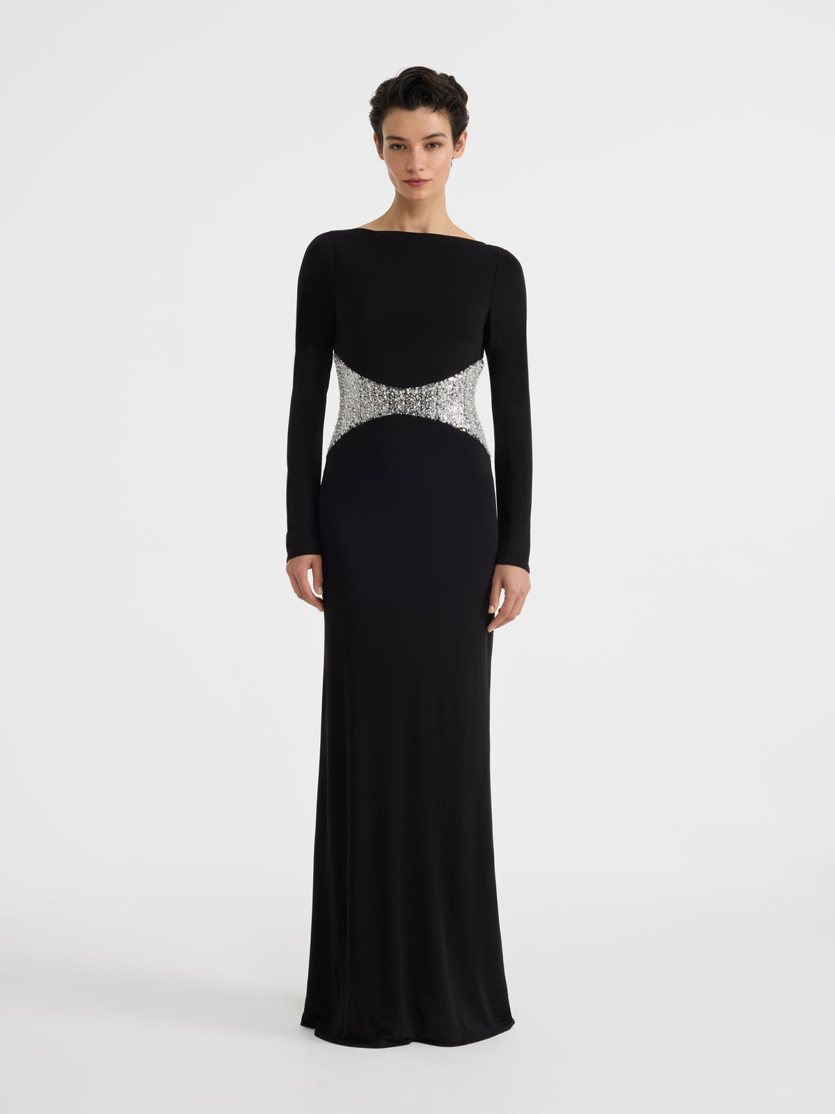 Black long sleeve jersey maxi dress with sequin waist panel, on model front view