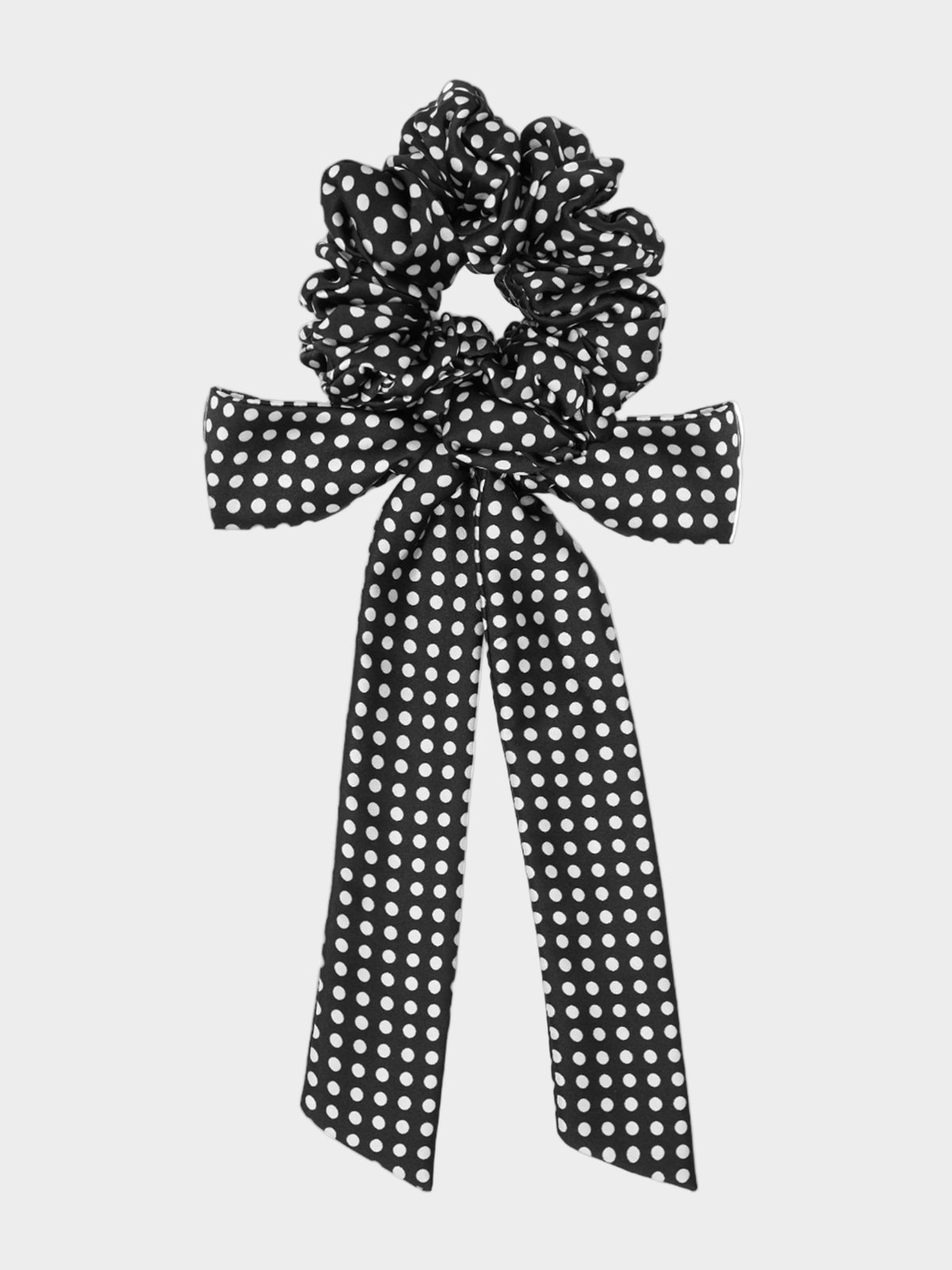 A black and white polka dot bow scrunchie. 
