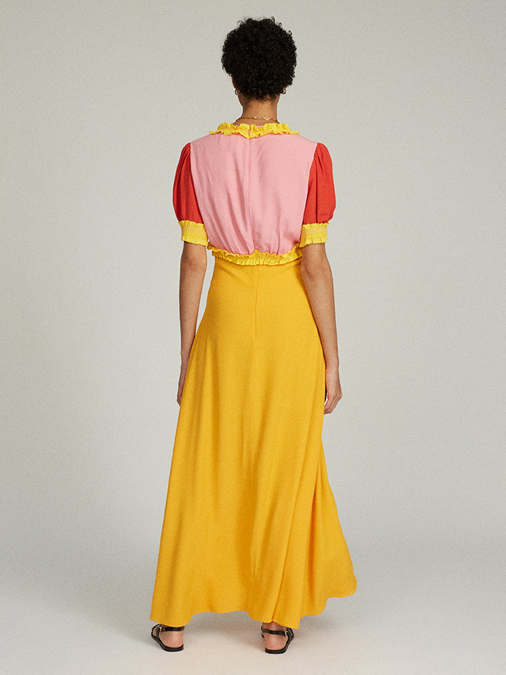 Load image into Gallery viewer, Lea Smocked Dress in Peach and Apricot